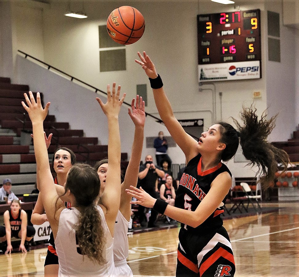 Ronan's LaReina Cordova puts up a shot against Butte Central. (Courtesy of Bob Gunderson)