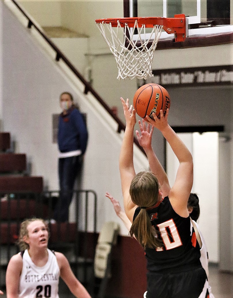 Jaylea Lunceford puts up a shot in the paint against Butte Central. (Courtesy of Bob Gunderson)