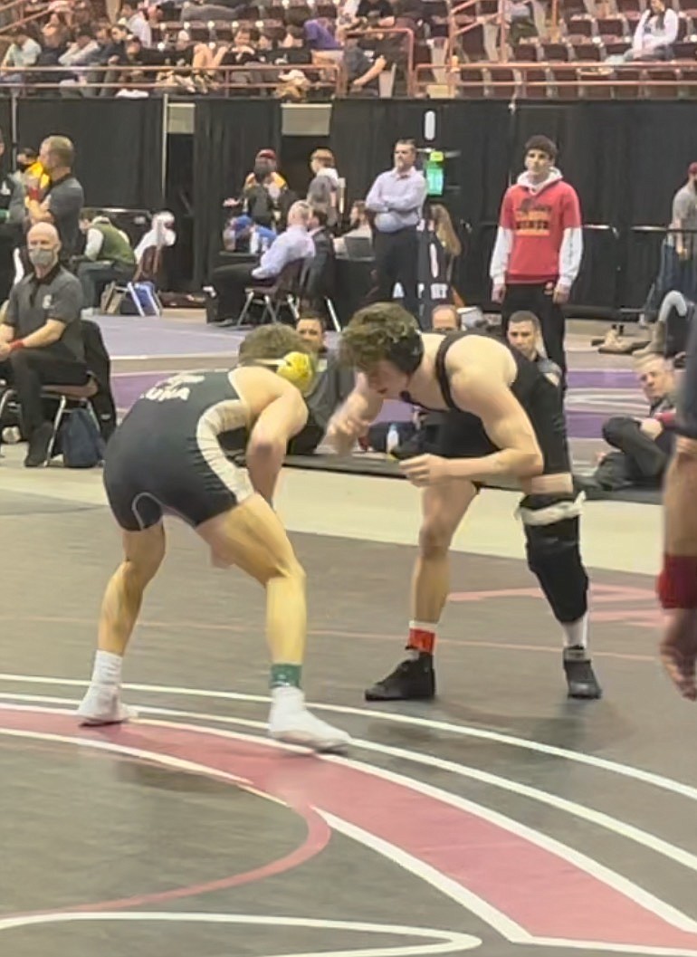 Photo courtesy JAN and JULIE SPEELMAN
Drew Roberts, right, of Coeur d'Alene, won the 5A 152-pound state championship Friday at the Ford Idaho Center in Nampa.