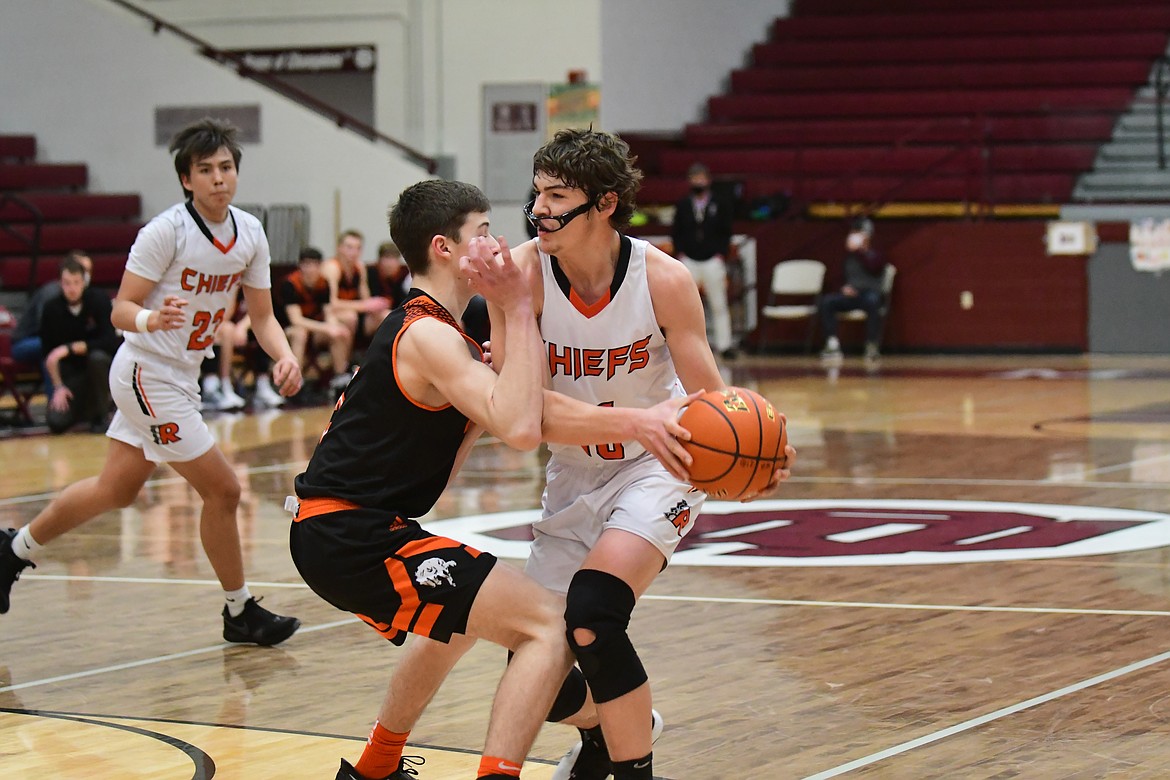 Payton Cates' glasses slide down under pressure from the Frenchtown defense. (Teresa Byrd/hungry Horse News)