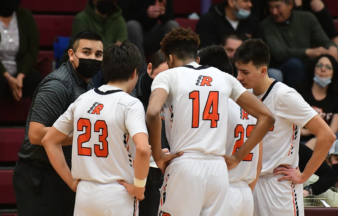 Ronan head coach DJ Fish huddles with his team during Saturday's game against Frenchtown. (Teresa Byrd/hungry Horse News)