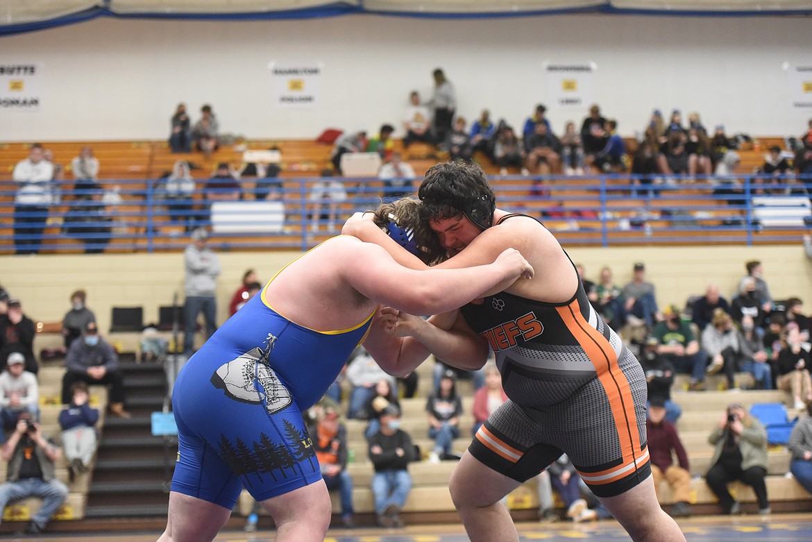 Ronan’s Max Morency takes on Greenchain’s Aydan Williamson in the semifinals of the heavyweight category Saturday at Libby. (Will Langhorne/The Western News)