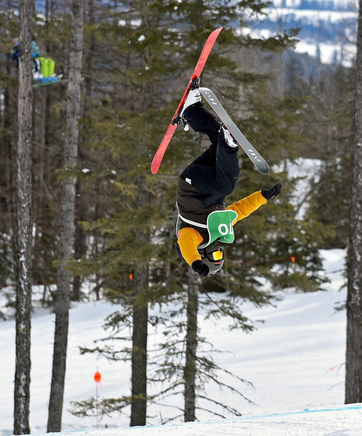 WMR Freestyle Team member Liam Byrd throws a front flip during the Presidents Park slopestyle competion at Whitefish Mountain Resort. Byrd competes in the 8-13 age group of the upper division. (Whitney England/Whitefish Pilot)