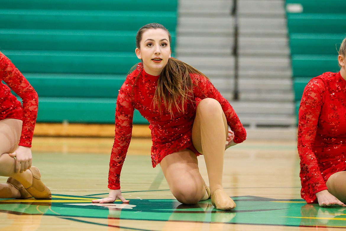 Mikah Little performs a kick routine at the regional dance competition Friday.