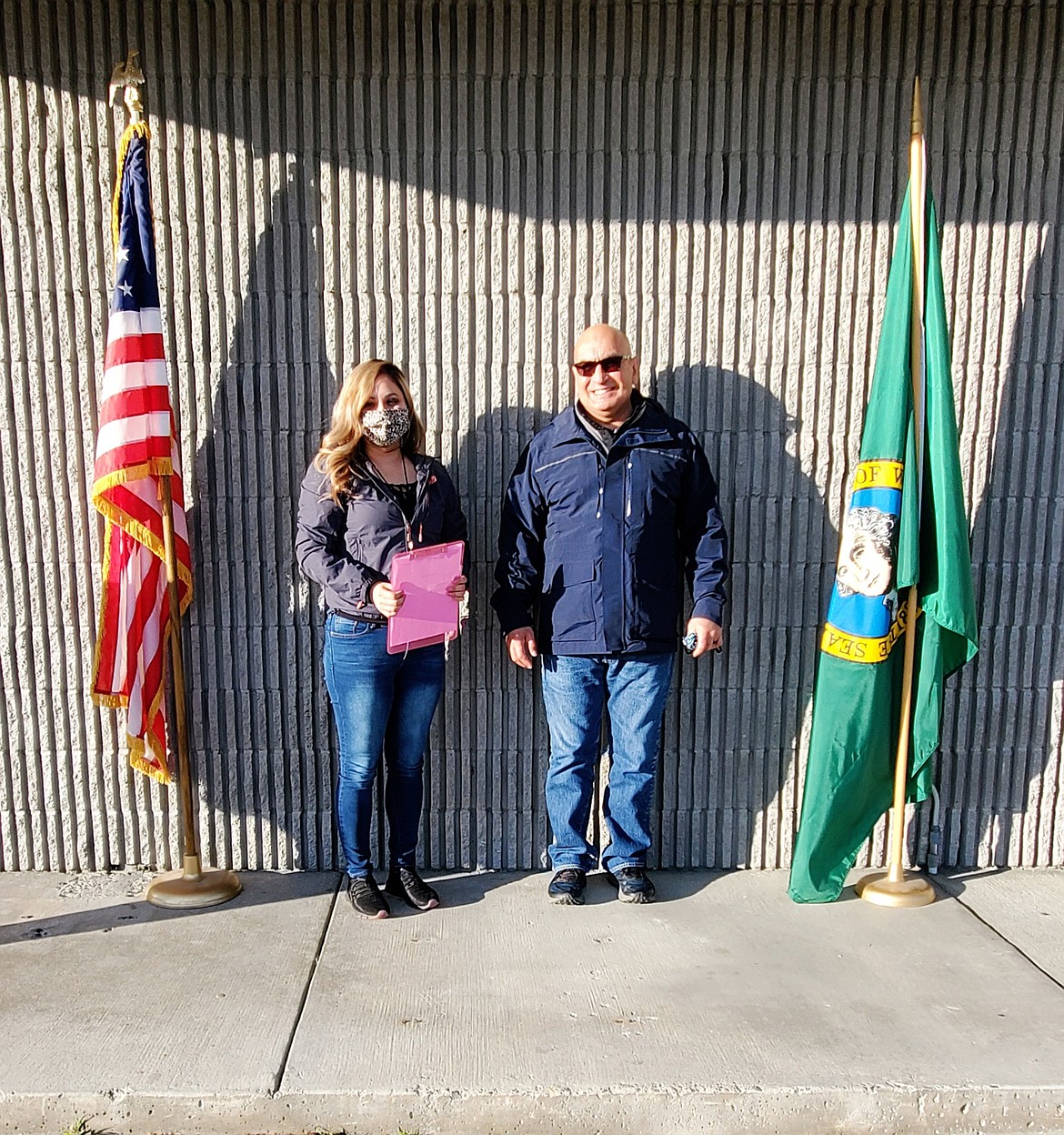 Mattawa City Clerk Anabel Martinez administers the oath of office to new Mattawa City Council member Vicente Acosts.