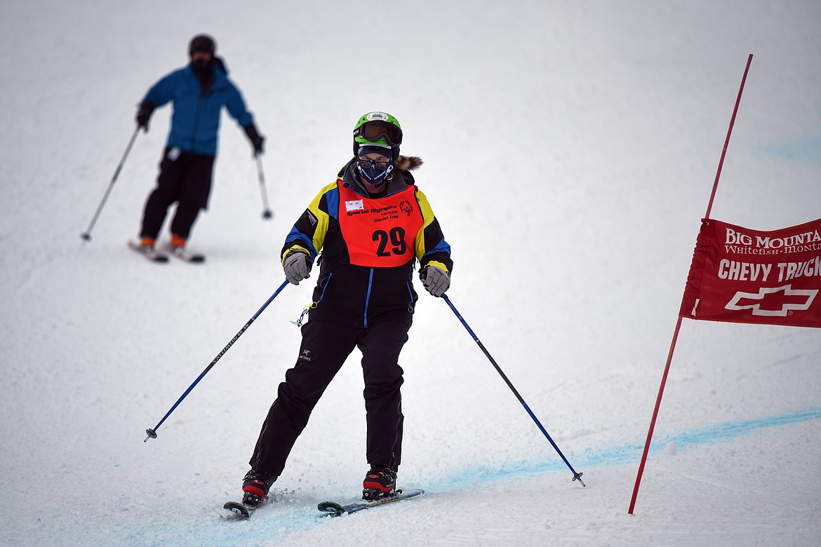 Jim Winegar, with the Flathead Industries team, weaves through the Alpine Novice Giant Slalom course at the Special Olympics Montana Winter Games at Whitefish Mountain Resort on Tuesday. (Casey Kreider/Daily Inter Lake)