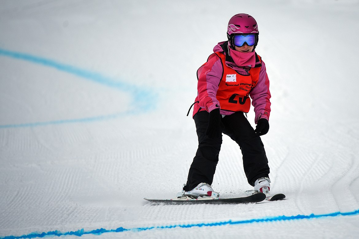Manda Humphrey, with the Flathead Industries team, crosses the finish line on the Alpine Novice Giant Slalom course at the Special Olympics Montana Winter Games at Whitefish Mountain Resort on Tuesday. (Casey Kreider/Daily Inter Lake)