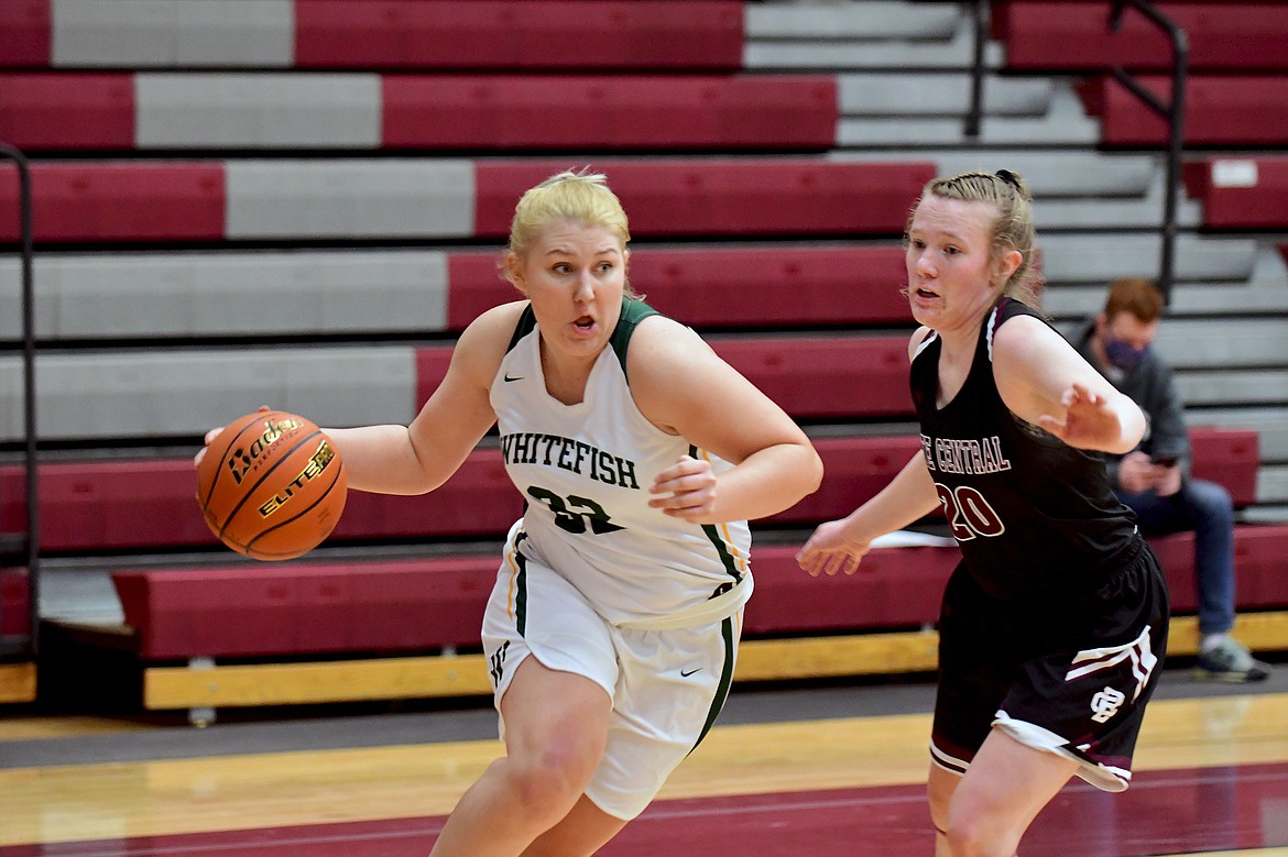 Lady Bulldog senior Brook Smith drives along the baseline against Butte Central during the Western A Divisional Tournament on Friday in Butte. (Teresa Byrd/Hungry Horse News)