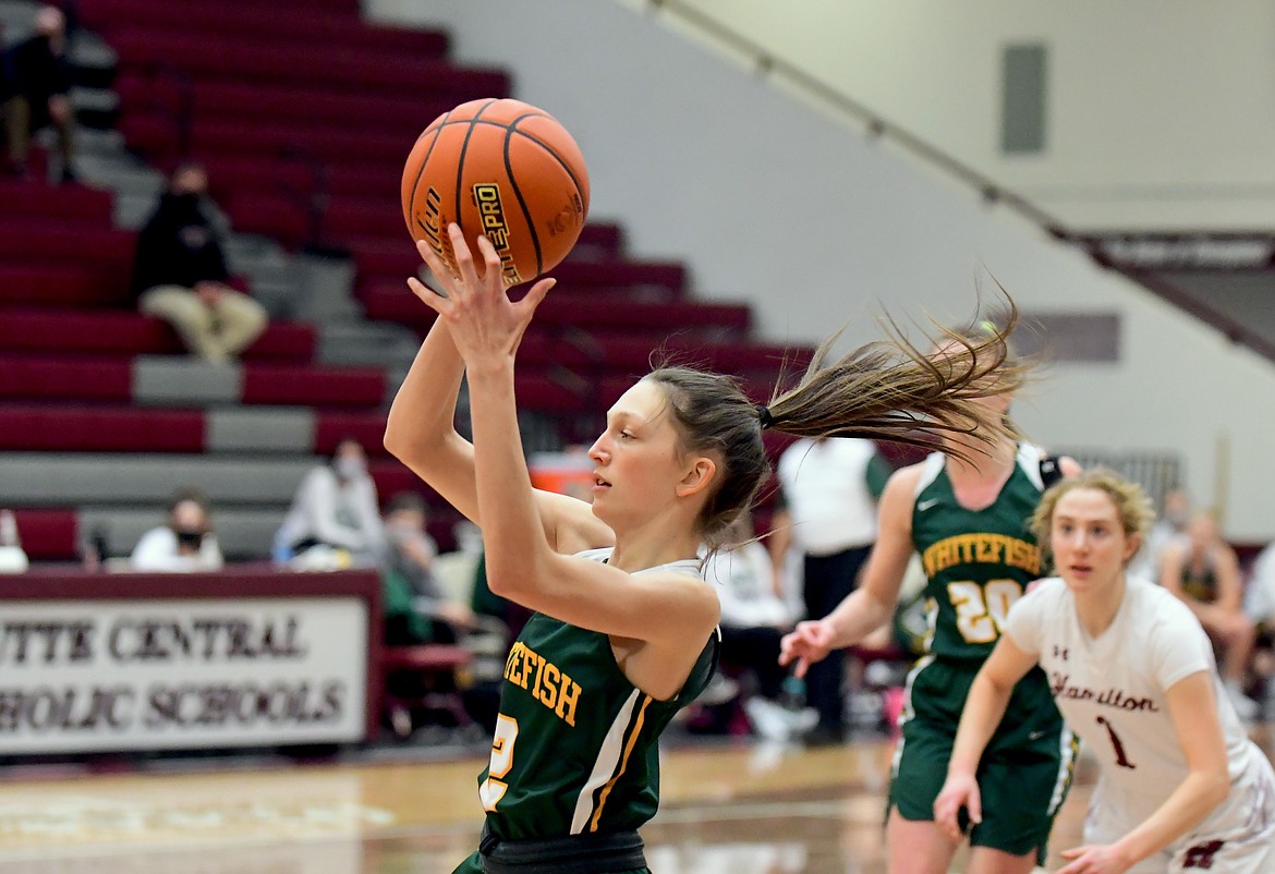 Whitefish's Erin Wilde catches a long pass during a game against Hamilton at the Western A Divisional Tournament in Butte on Thursday. (Teresa Byrd/Hungry Horse News)