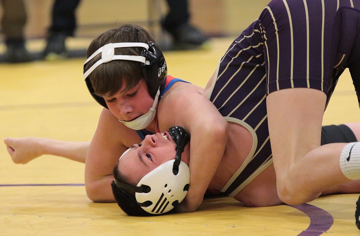 Viking Traic Fainter pinned Cut Bank's Richard Schmidt in 23 seconds in the consolation semifinals of the 103-pound division of the Class B/C Divisional wrestling meet in Cut Bank.
Courtesy Sally Anderson