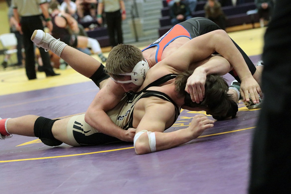 Viking Joseph Ferrier takes on Cascade's Connor Sawyer in the third-place match of the 170-pound division Saturday.
Courtesy Sally Anderson