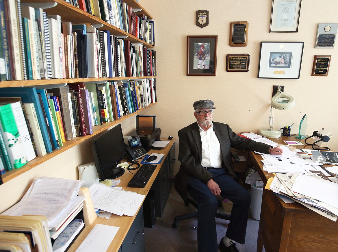 Robert Singletary sits at his desk in his office at The Museum of North Idaho.