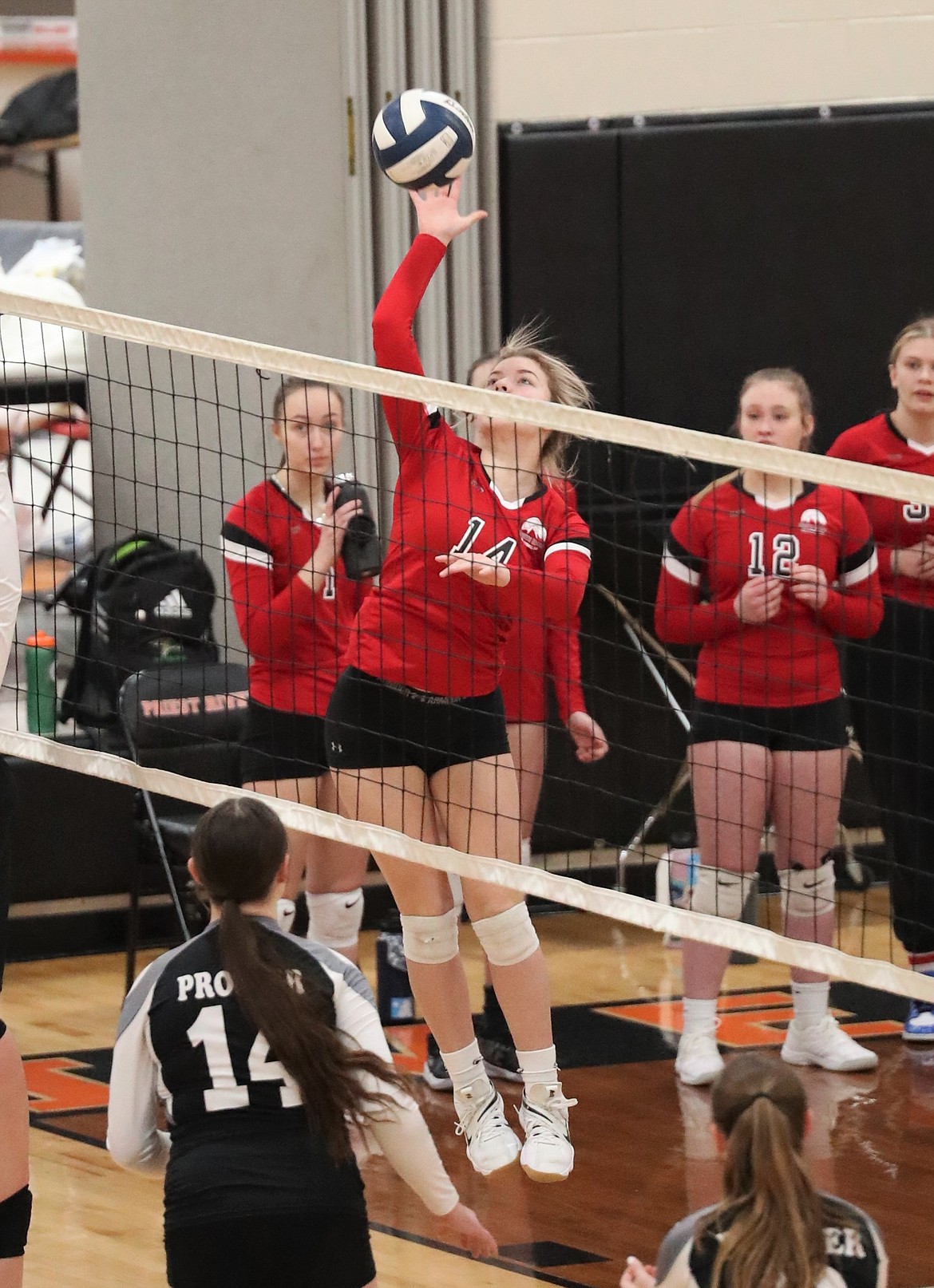 Antonella Peitz, a member of the U16 North Idaho Volleyball Club, goes up for a kill on Sunday.