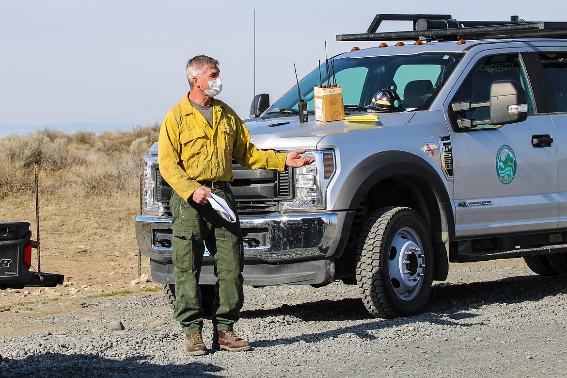 Prescribed fire manager Matt Eberlein, the "Burn Boss," goes over protocol Tuesday morning.