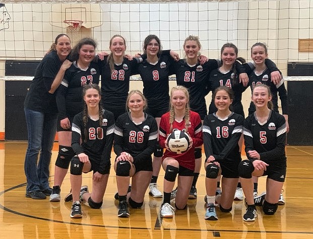 The North Idaho Volleyball Club U14 team following its the consolation bracket win at the River City Invitational. Club volleyball has helped develop and grow the high school volleyball team.