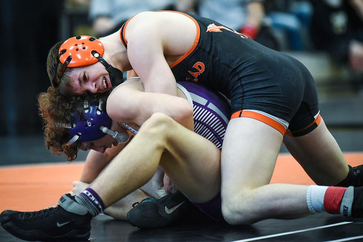 Flathead's Anders Thompson wrestles Butte's Connor Konda at 138 lbs. at the State AA wrestling championships at Flathead High School on Friday. (Casey Kreider/Daily Inter Lake)