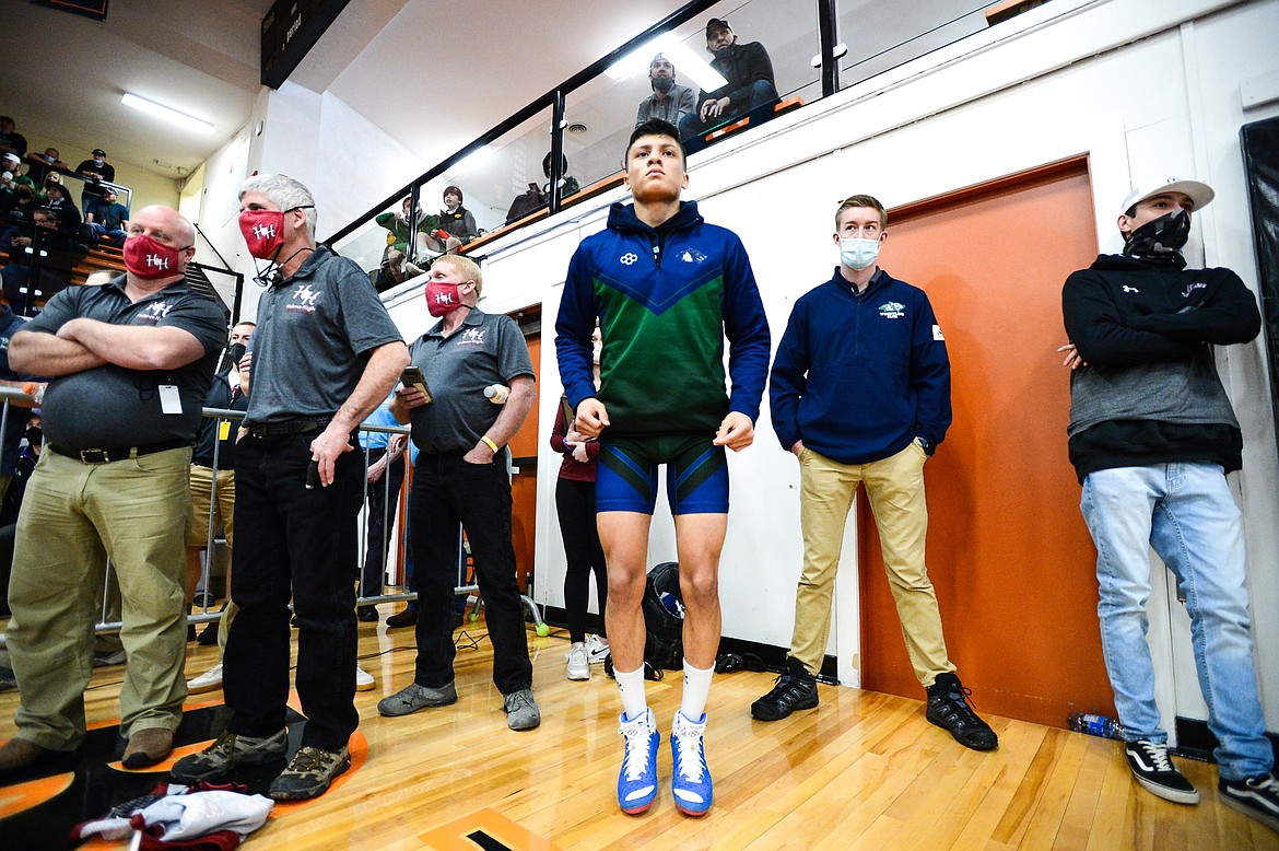 Glacier's Teegan Vasquez waits for his match at 120 lbs. with Butte's Cole Worley at the State AA wrestling championships at Flathead High School on Friday. (Casey Kreider/Daily Inter Lake)