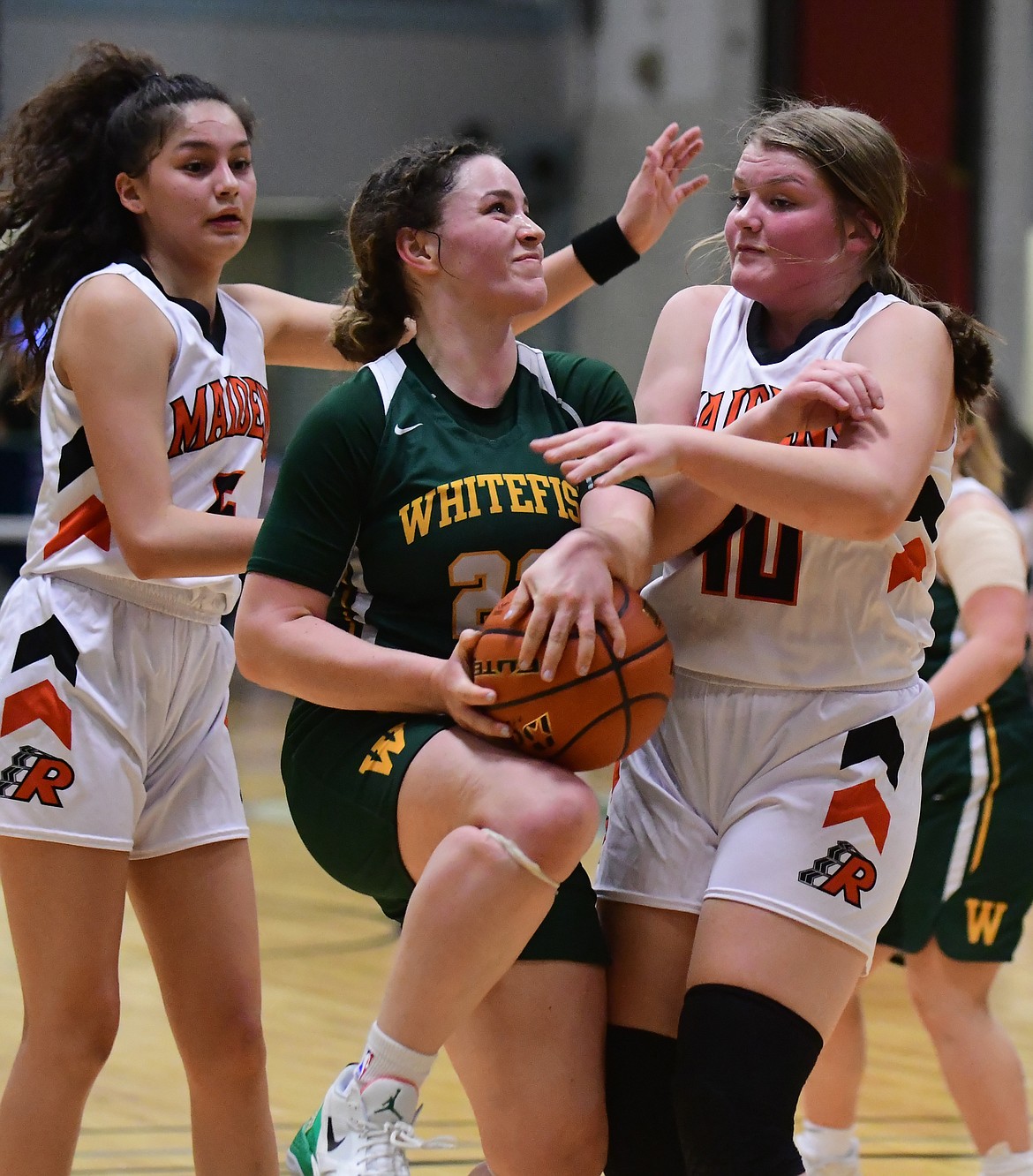 Whitefish’s Gracie Smyley goes up for a shot against Ronan during the first loser out bracket game of the state A tournament in Great Falls on Thursday. The Bulldogs beat Ronan 56-49. (Teresa Byrd/Hungry Horse News)