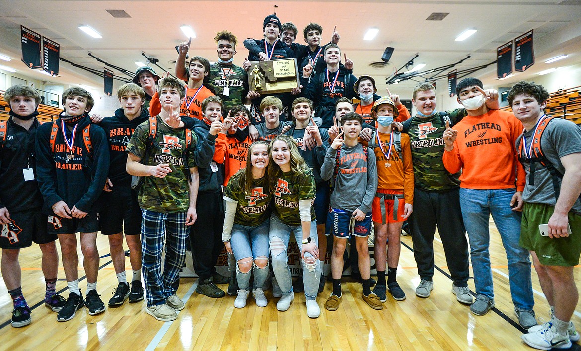 Flathead celebrates after winning the team title at the State AA wrestling tournament at Flathead High School on Saturday. (Casey Kreider/Daily Inter Lake)