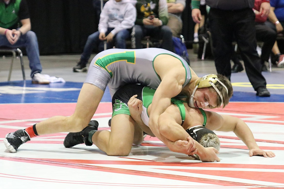 Photo courtesy of DAVID QUIMBY
Lakeland High senior Riley Siegford takes on Blackfoot's Austin Ramirez in the 145-pound championship of the state 4A wrestling tournament on Feb. 26 at the Ford Idaho Center in Nampa. The title was Siegford's first.