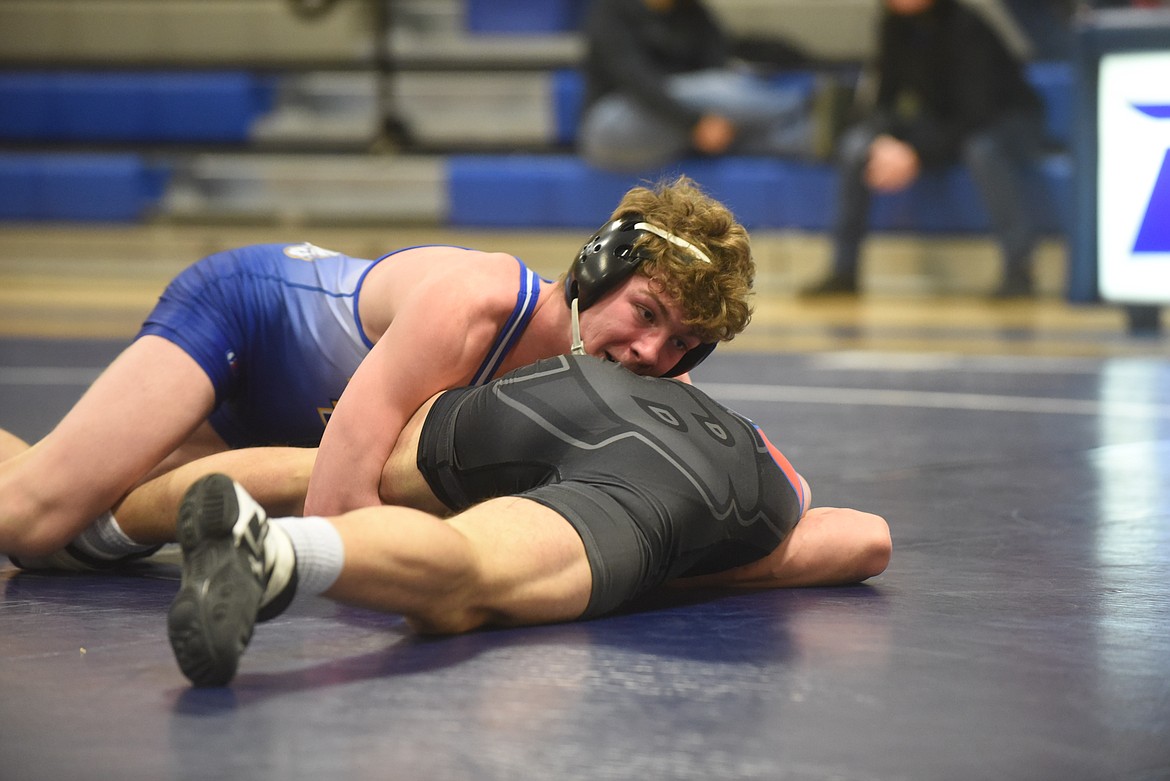 Thompson Falls wrestler Eli Ratliff, shown here in a match against Bigfork earlier this season, placed fourth at the Montana High School Association B-C tournament last weekend. (Scott Shindledecker/Valley Press)