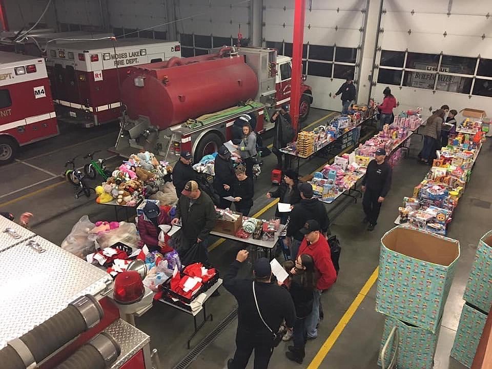 Firefighters for Kids preparing donations for Christmas, 2018 at Fire Station 1 in Moses Lake, WA.