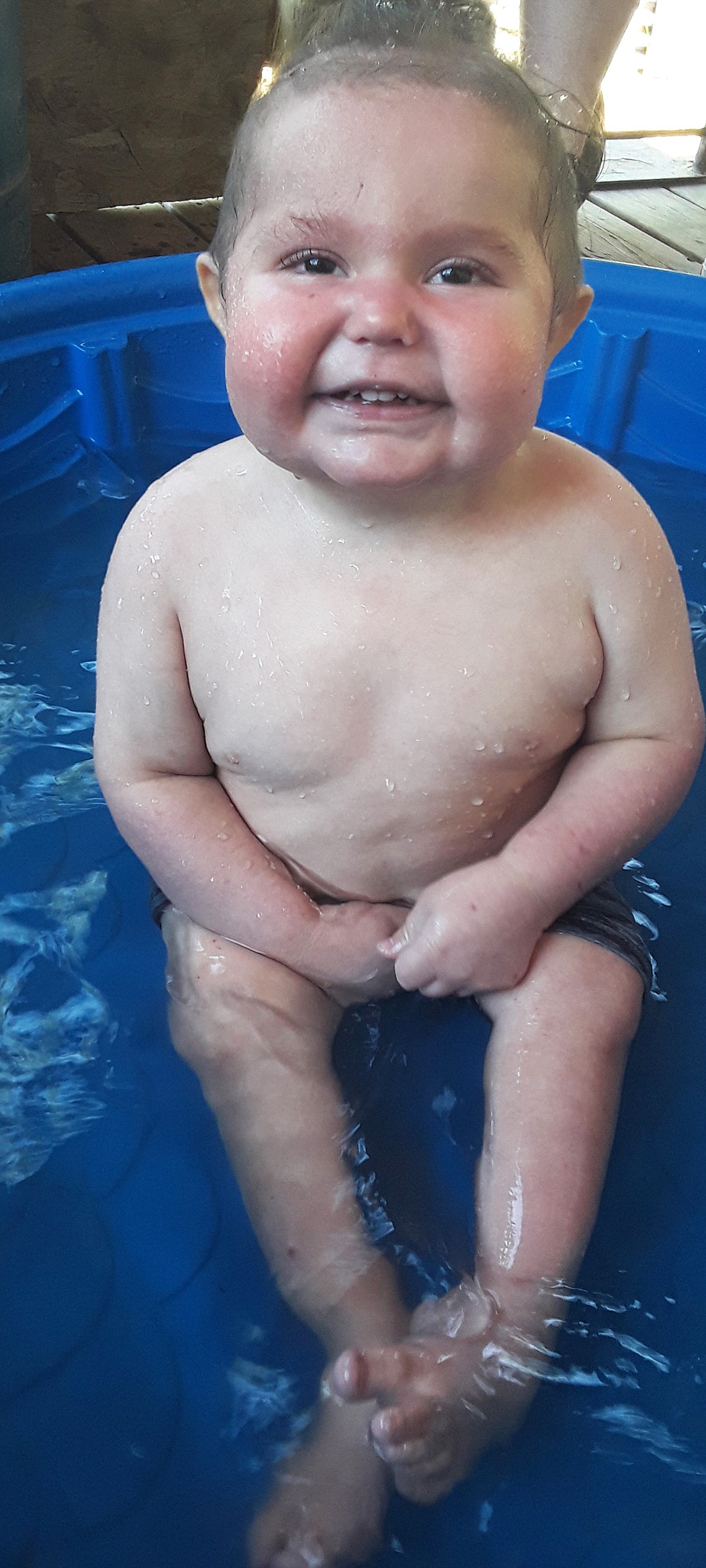 Rayden Darby enjoys his first trip to a pool.