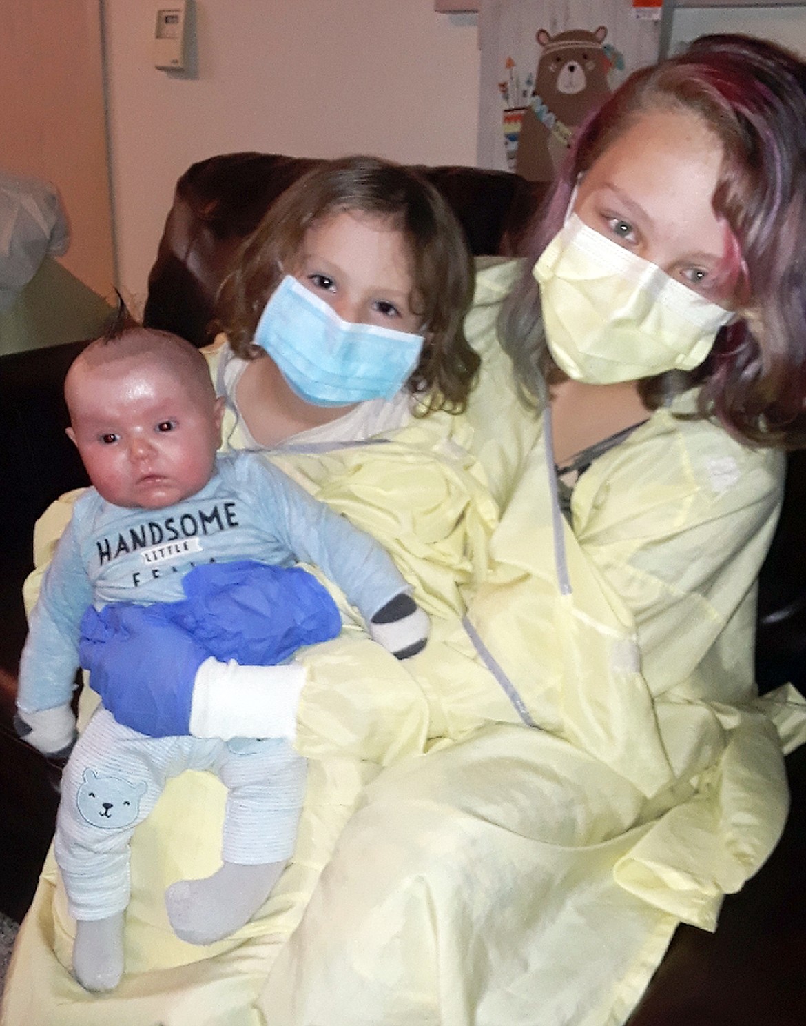 Siblings Kai, Shailyn and Rayden Darby together for the first time. Masks and gowns have kept and were keeping Rayden protected and safe long before COVID came about.