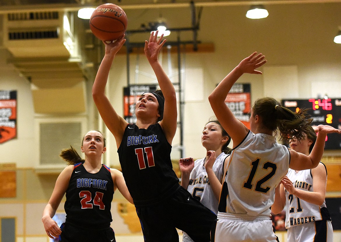 Bigfork's Emma Berreth pulls up for a tough shot in the second quarter of the Valkyries win over Deer Lodge at the Western B Divisional Basketball Tournament in Eureka Thursday. (Jeremy Weber/Daily Inter Lake)
