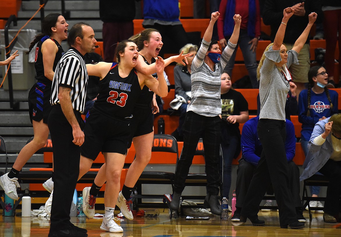 The Bigfork Valkyries bench celebrates after defeating Thompson Falls. (Jeremy Weber/Daily Inter Lake)