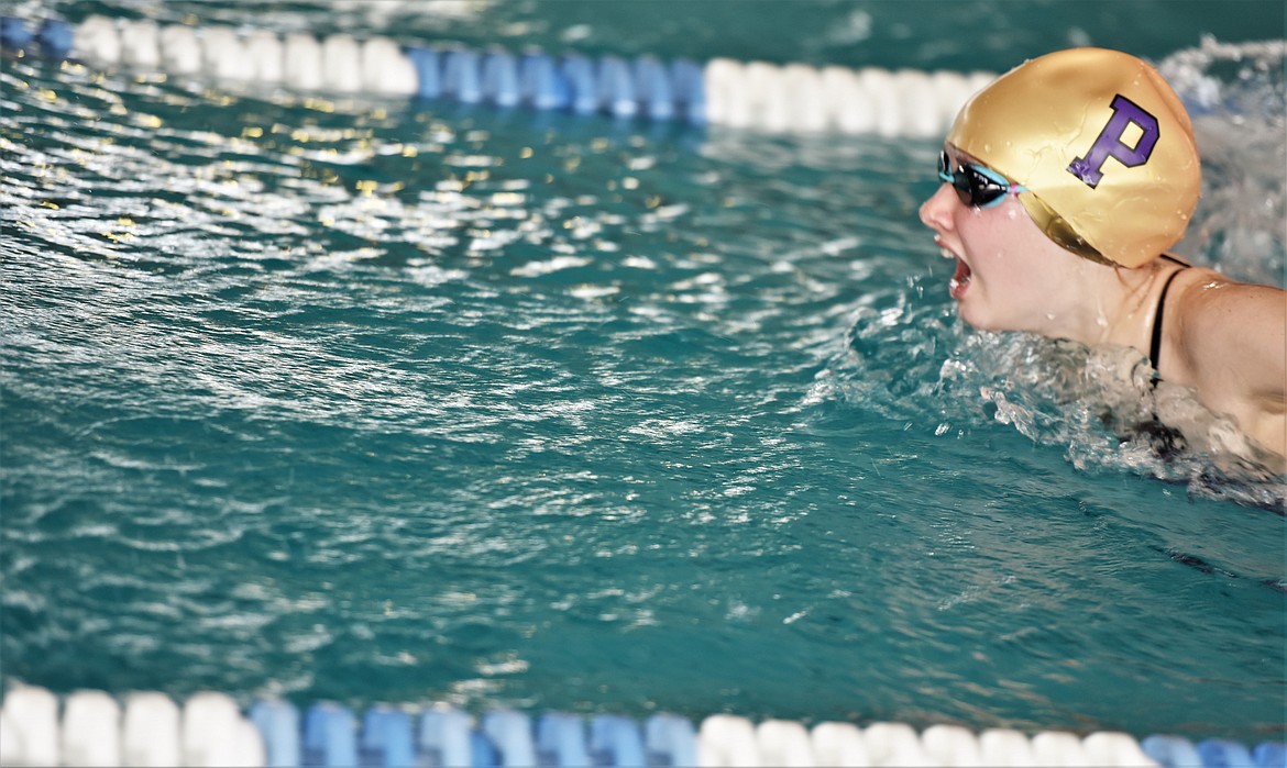 Isabelle Seeley of Polson competes in the 100-yard breaststroke. (Scot Heisel/Lake County Leader)
