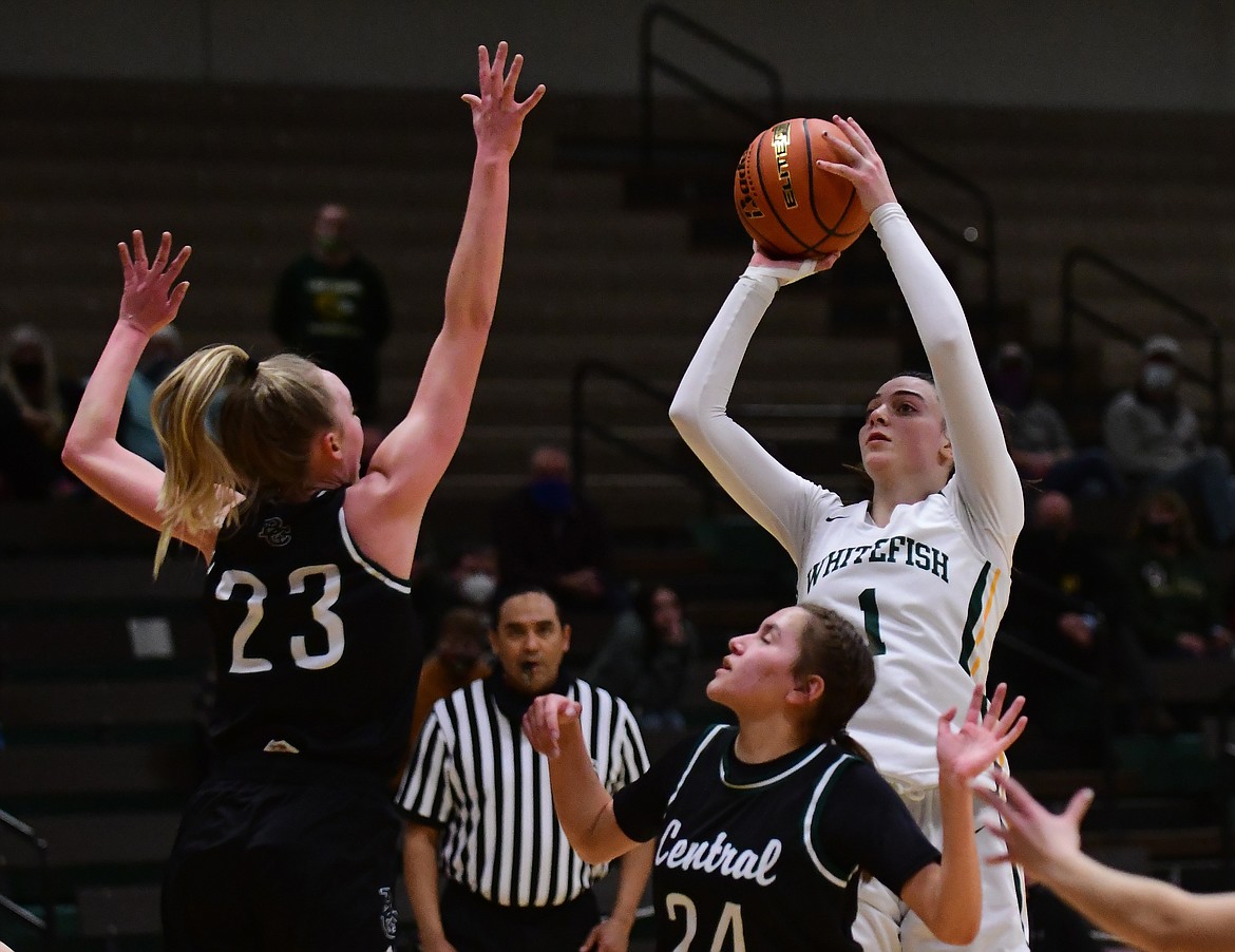 Whitefish's Jadi Walburn rises up over Billings Central defense for a shot during a game at the MHSA Class A State Tournament on Wednesday, March 3 in Great Falls. (Teresa Byrd/Hungry Horse News)