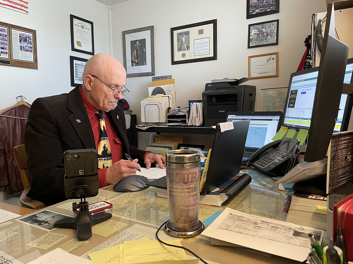 Rep. Tom Dent, R-Moses Lake, sits in an office in his hangar out at the Moses Lake Municipal Airport during Monday's session of the Washington State House of Representatives, which is mostly online this year.