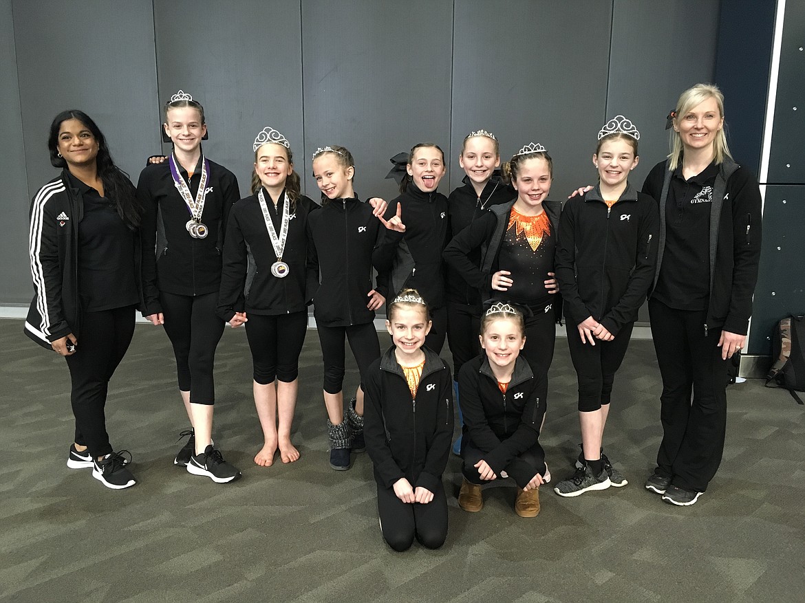 Courtesy photo
North Idaho Gymnastics Level 4 athletes competed at the Royal Festival at the Spokane Convention Center March 6-7. In the front row from left are Saydee Mathews and Macee Caudle (3rd AA), and back row from left, coach Sita Custer, Lilah Campbell (2nd AA Level 5), Evyn Lyon (1st AA Level 5), Ashlyn Karle, Ollie Dudley, Arie Ferguson, Evelyn Oswell (3rd AA), Kylie Burg (1st AA) and coach Meloney Butcher.