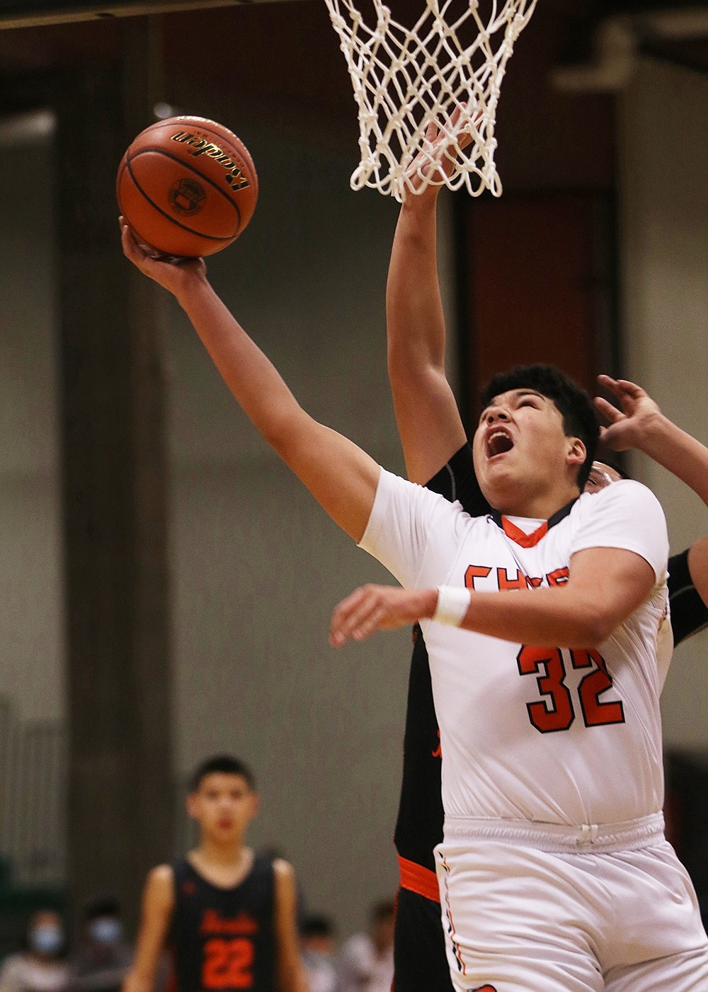 Marlo Tonasket puts up a shot in the paint during Ronan's win over Hardin at the state tournament. (Courtesy of Bob Gunderson)