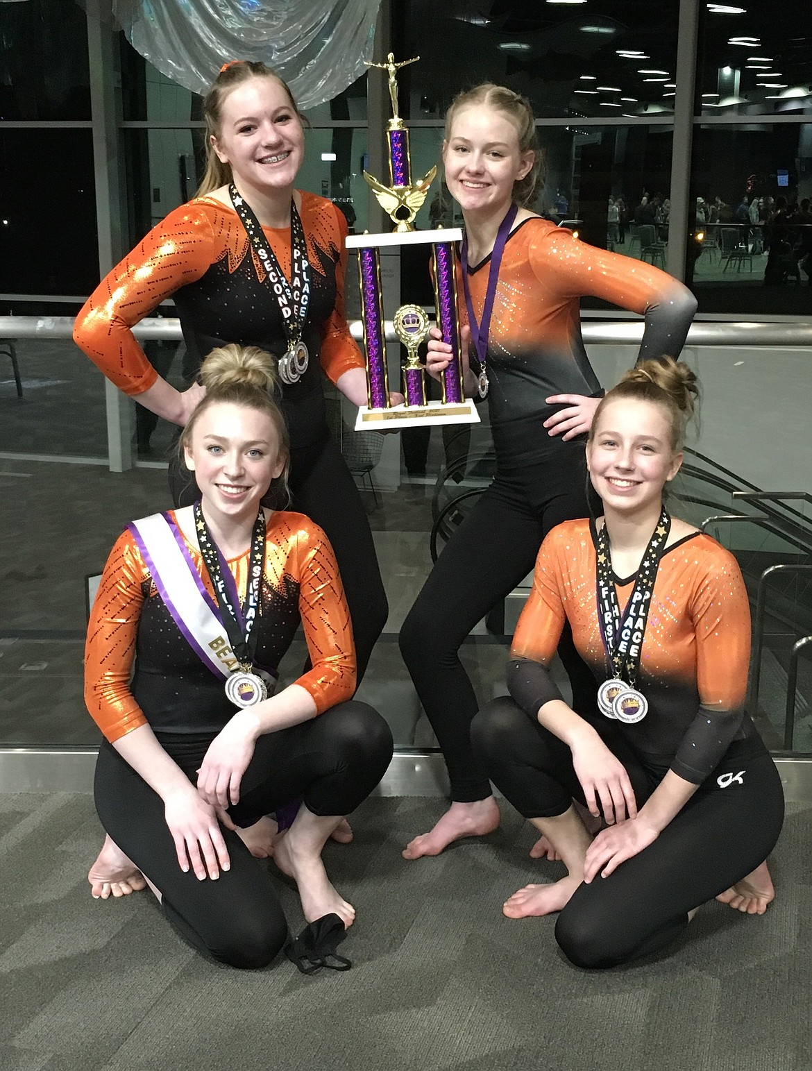 Courtesy photo
North Idaho Gymnastics Xcel Platinum took first place team at the Royal Festival at the Spokane Convention Center March 6-7. In the front row from left are Taryn Olson and Alyssa Caywood; and back row from left, Dakota Caudle and Kelsie Geissinger.