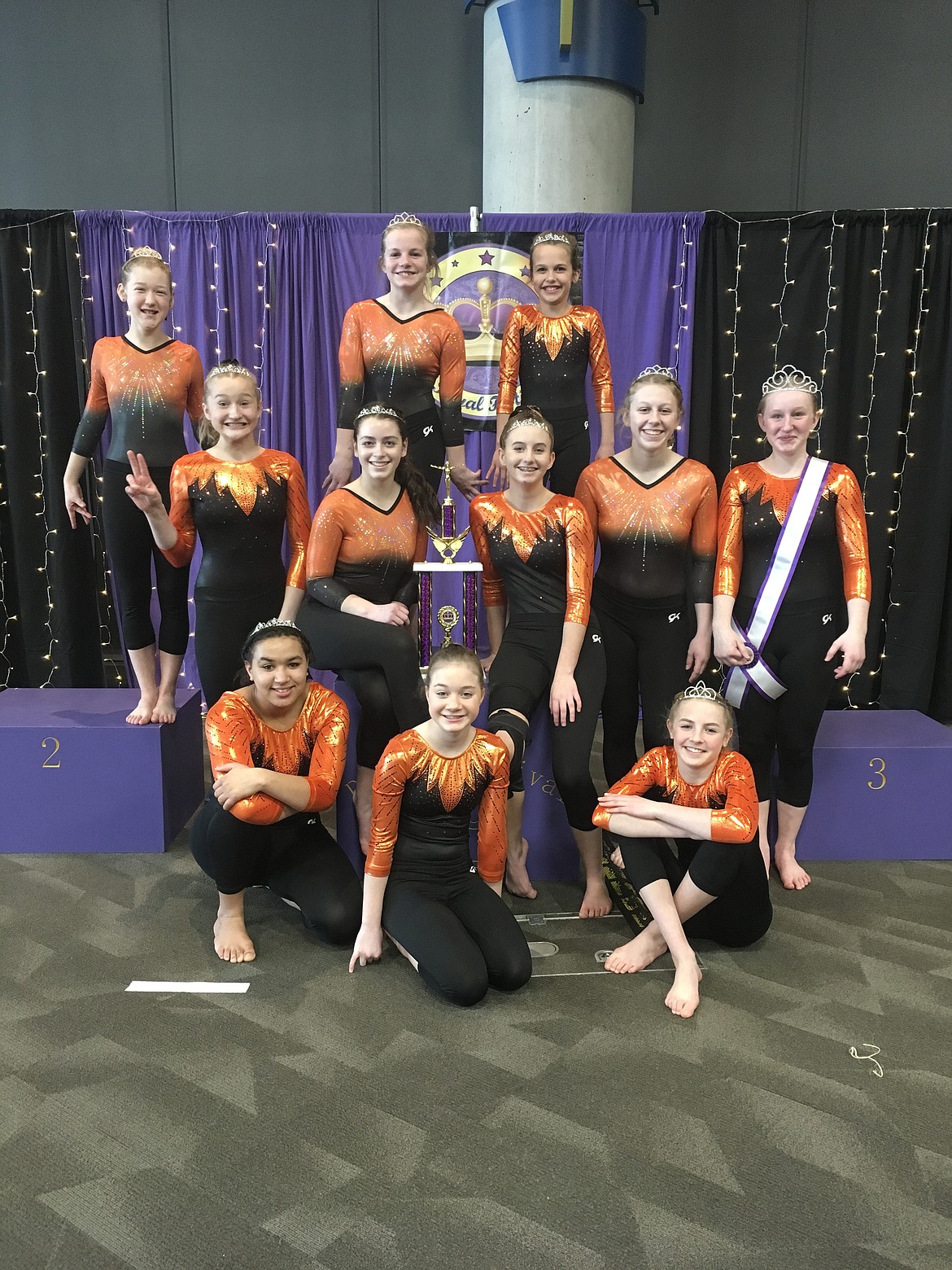 Courtesy photo
North Idaho Gymnastics Xcel Silvers took first place team at the Royal Festival at the Spokane Convention Center March 6-7. In the front row from left are Shariece Vandever, Lexi Screibeis and Dani Chance; second row from left, Charlee Friddle, Jonni Sanborn, Makenna Hillman, Madalyn Day and Lynzey Davis; and back row from left, Shelby Adkison, Macie Uhlenkott and Ella Johnson.