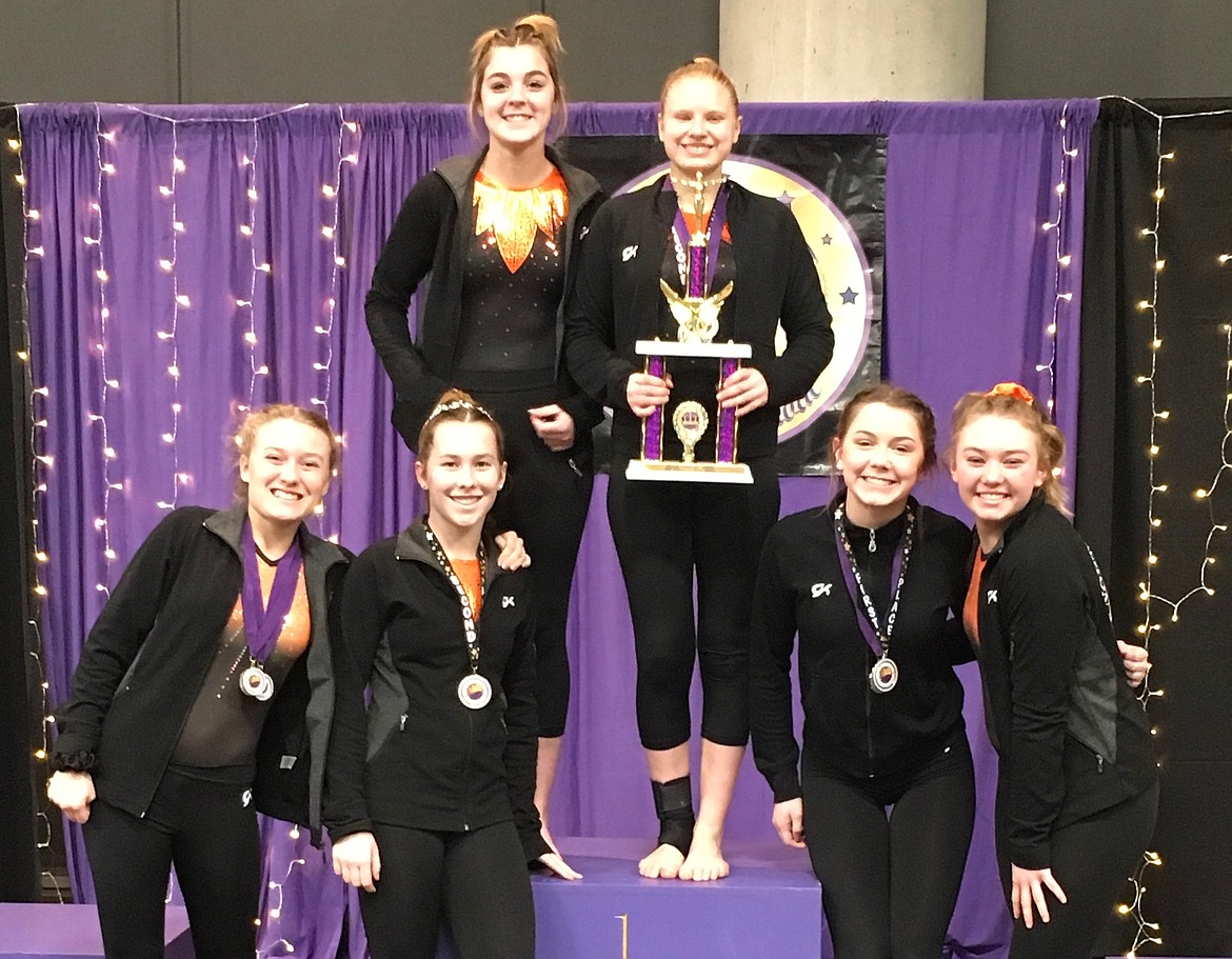 Courtesy photo
North Idaho Gymnastics Xcel Gold took fourth place team at the Royal Festival at the Spokane Convention Center March 6-7. In the front row from left are Faith Iverson, Kendayrah Hammer, Caitlyn Morgan and Riley Walton; and back row from left, Keana Pettyjohn, Izzy McCaslin.