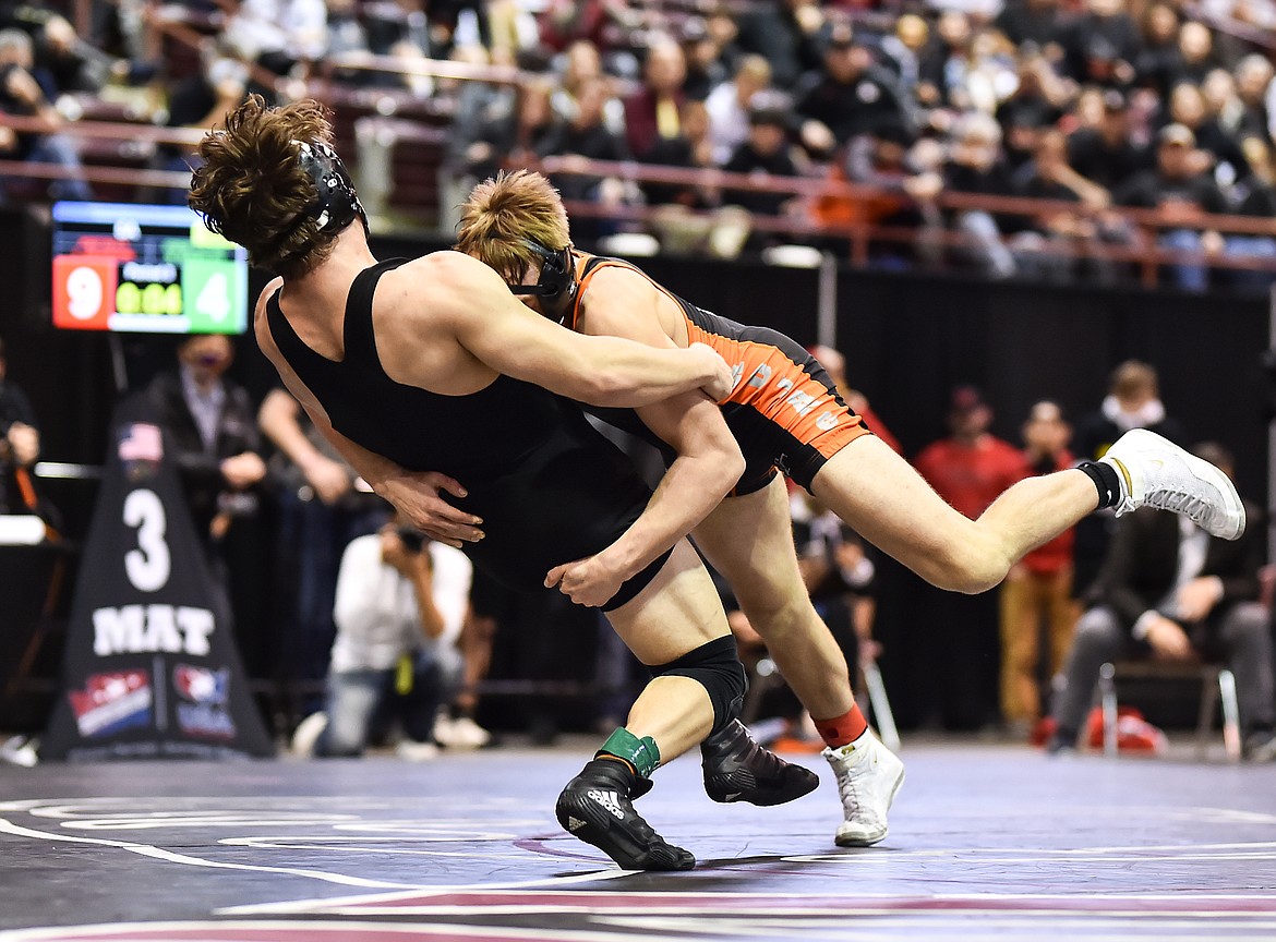 Courtesy photo
Post Falls High senior Lane Reardon takes down Coeur d'Alene's Nolan Randles in the state 5A 145-pound championship match on Feb. 26 at the Ford Idaho Center in Nampa. Reardon won the match by an 11-4 decision.