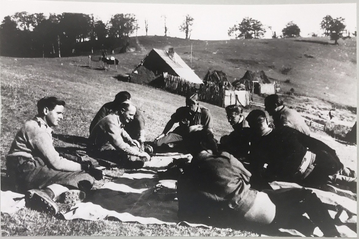 Downed Allied airmen in World War II among about 500 rescued by Chetniks and Serbian locals in Pranjane, Yugoslavia, in 1944 awaiting evacuation flights.