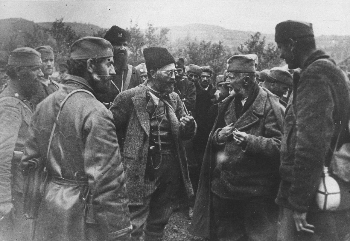 Draza Mihailovich with Chetnik guerrillas in mountains of Yugoslavia (c. 1943).