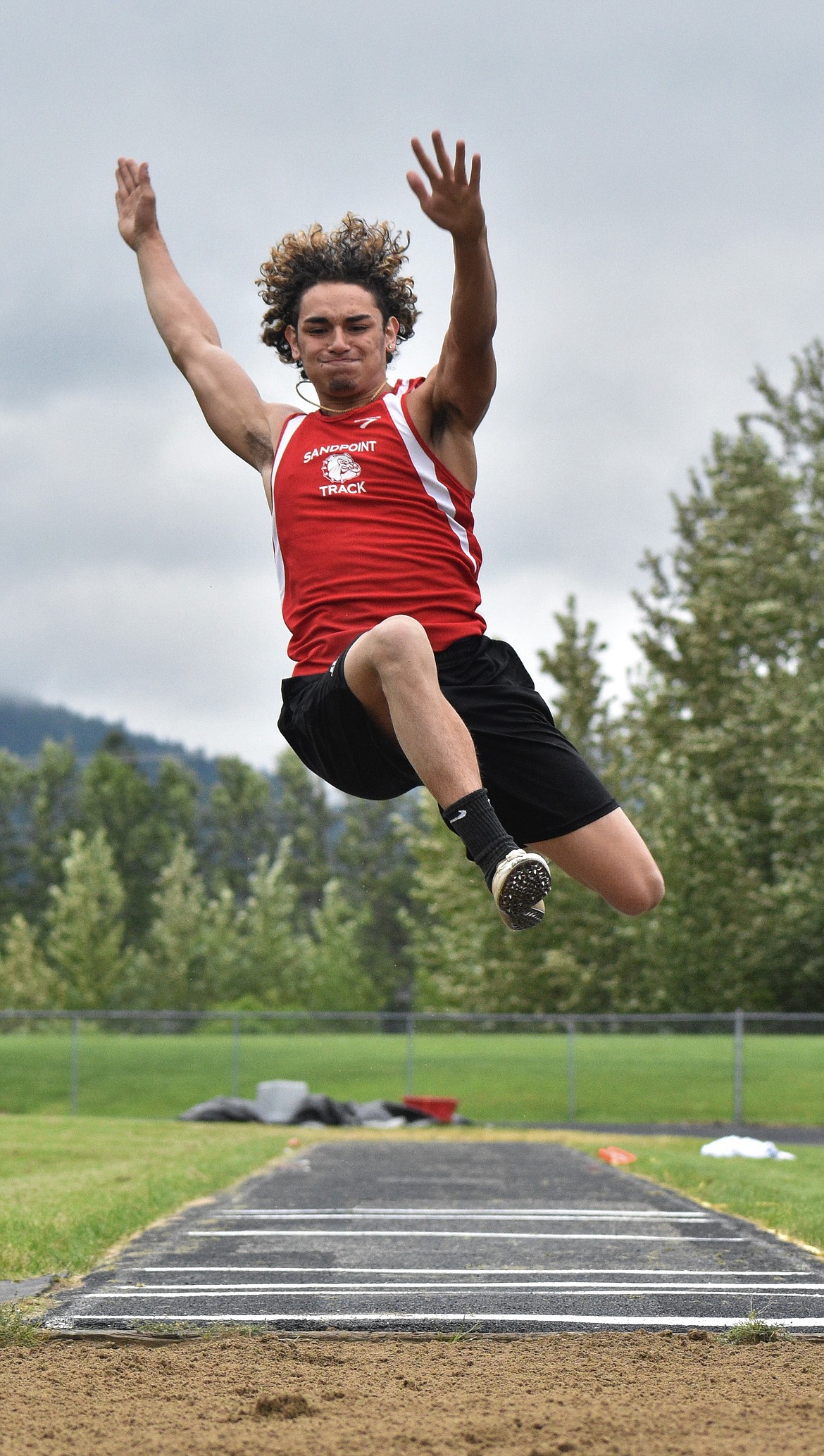 Braden Kappen takes off in the long jump at the Sandpoint Open on June 13, 2020.