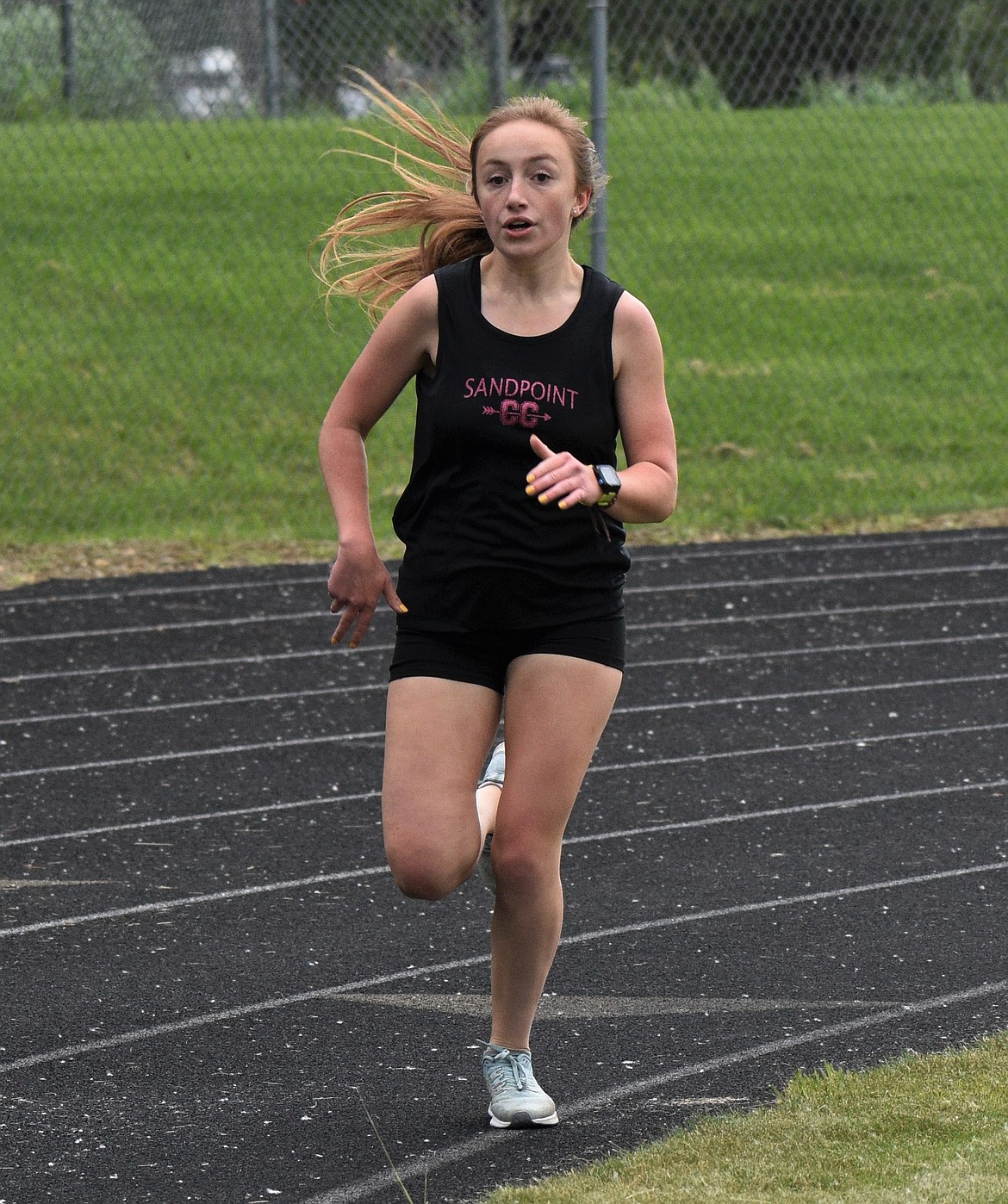 Camille Neuder rounds the track in the 800 at the Sandpoint Open on June 13, 2020.