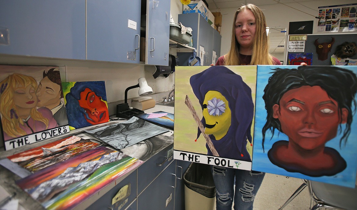 Honors art student Sofia Rhoades showcases a variety of her creations in Lindsey Johnson's class on Tuesday. Sofia has business aspirations for her works and has already set up a shop on Etsy under "OnTheWhiteWalls."