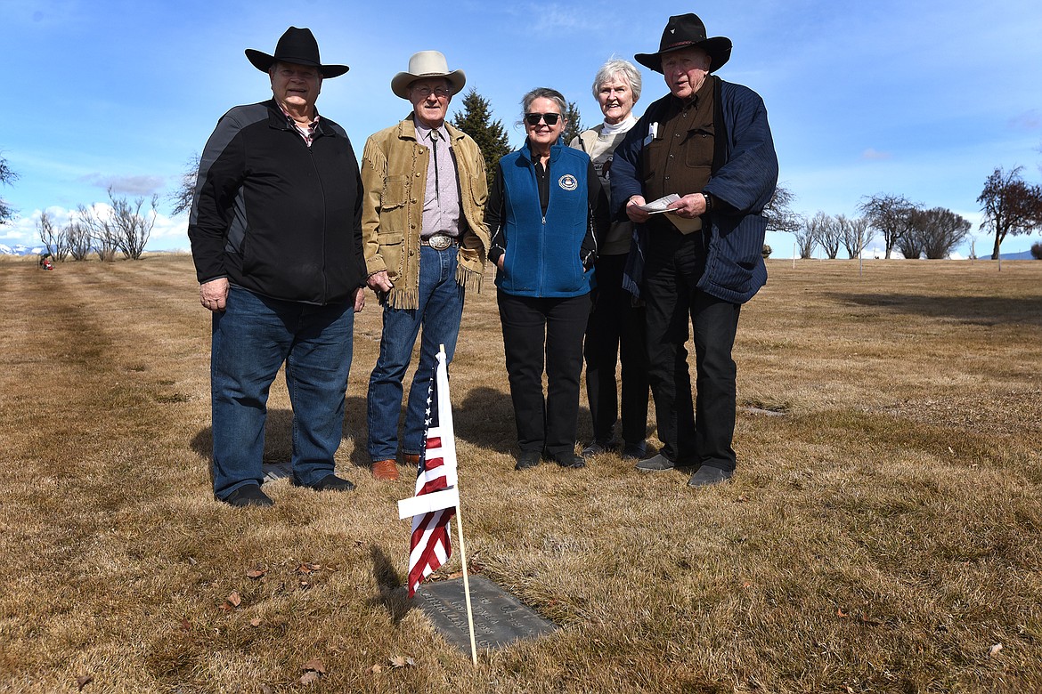 Former FBI Special Agents Gary Wanberg, Mickey Clark, Sue Borrego, widow of a deceased agent Marian Strong and former agent Warren Little honor FBI service martyr Terry Hereford at Kalispell's Glacier Memorial Gardens Tuesday. (Jeremy Weber/Daily Inter Lake)