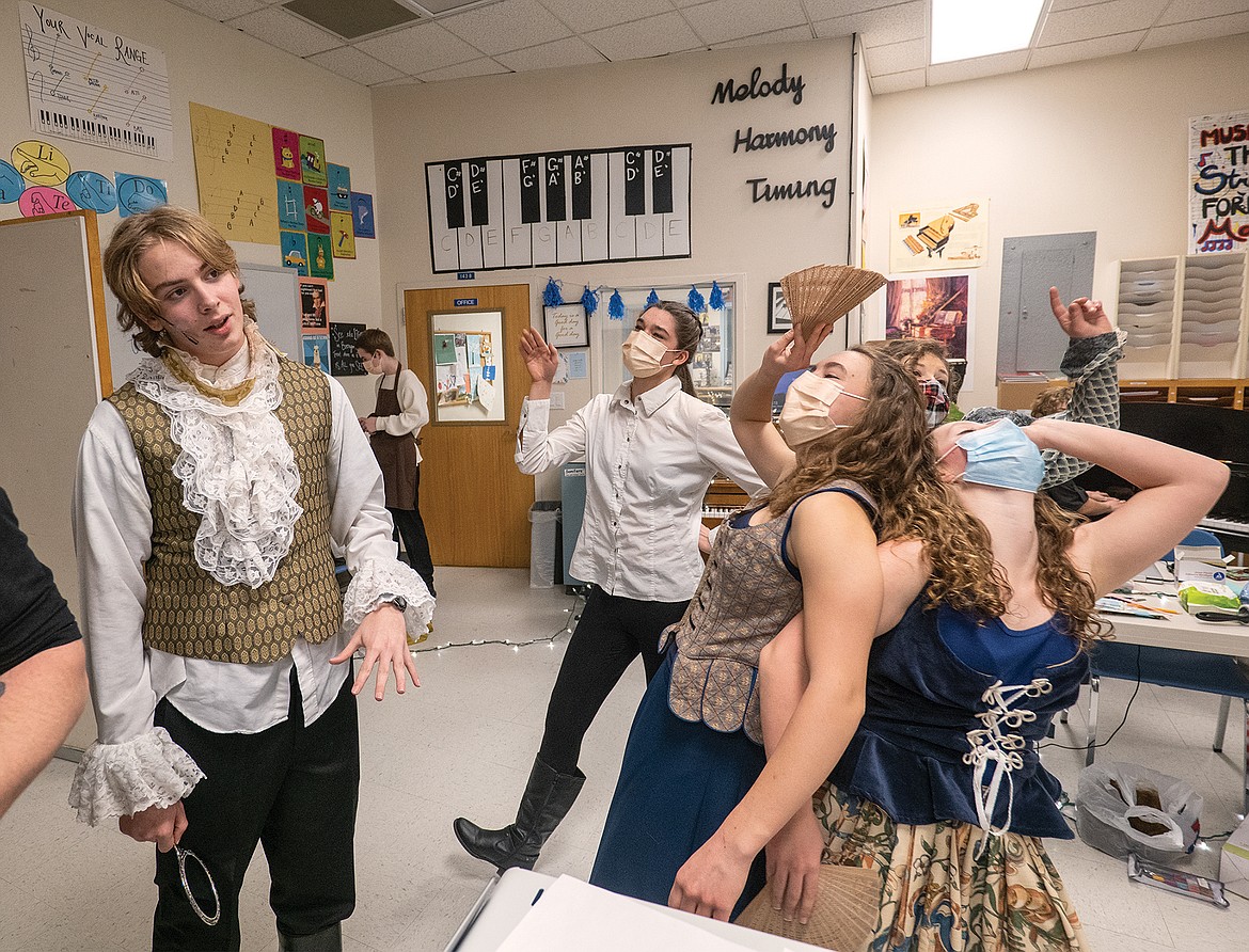 Working on songs back stage, from left are Lucas Counts, Colton Little (in the back), Ave McDonald, Kate Hatfield, Madison Ypma, and Rachel Cincis.