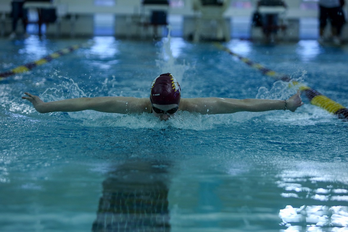 Moses Lake freshman Issabelle Parrish makes her away across the pool during the 200 yard individual medley event on Thursday night at the Tony St. Onge Pool of Dreams at MLHS.