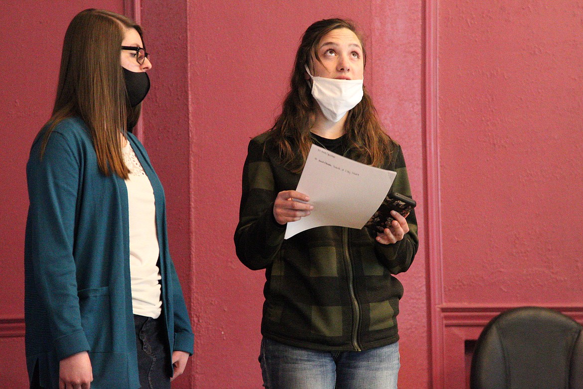 High school students from left Alaina Moore and Samantha Newton presented a petition that seeks to repel mask requirements at Libby Public Schools to the school board March 8. (Will Langhorne/The Western News)