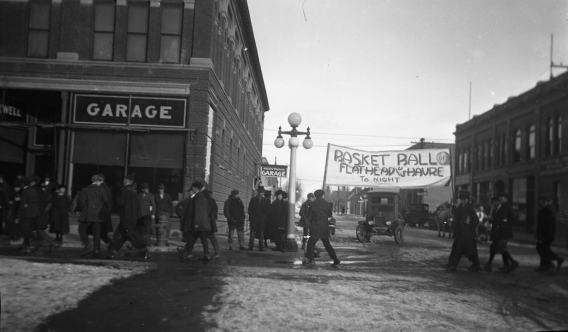 A pre-game parade down Main Street before a high school basketball game between Kalispell and Havre. (Vernon Weed photo)