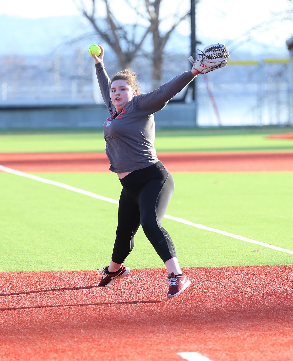 Via Barlow winds up to throw a pitch during a practice last week at War Memorial Field.